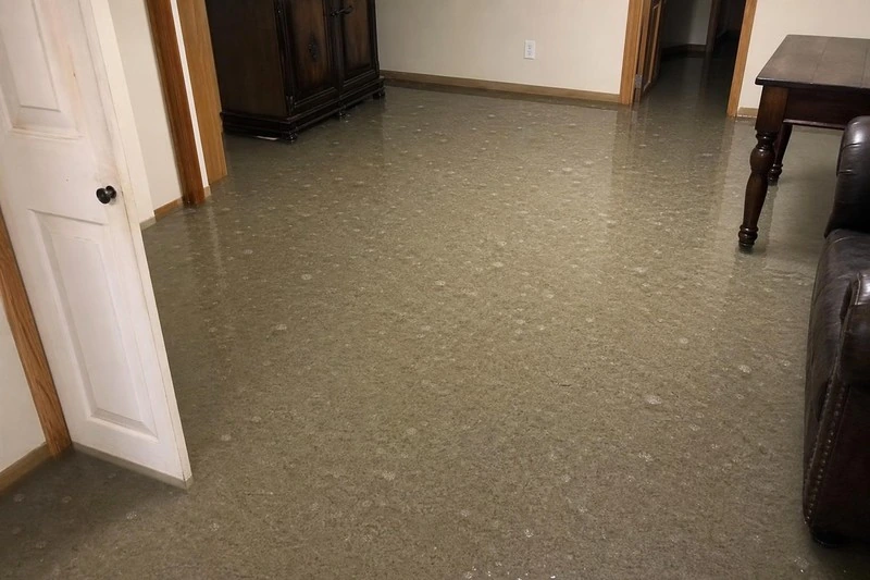 Every inch of carpet in this Woods Cross lower level is under water, furniture feet and door casings cut off at one flat line